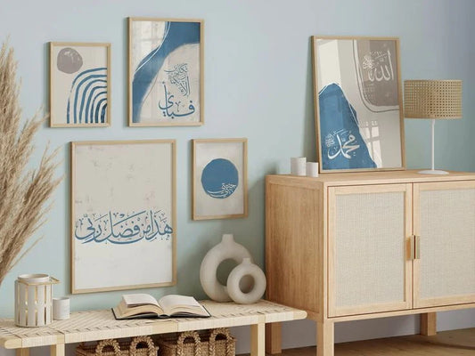 Decorative interior with framed art, a lamp, and a cabinet against a light blue wall.