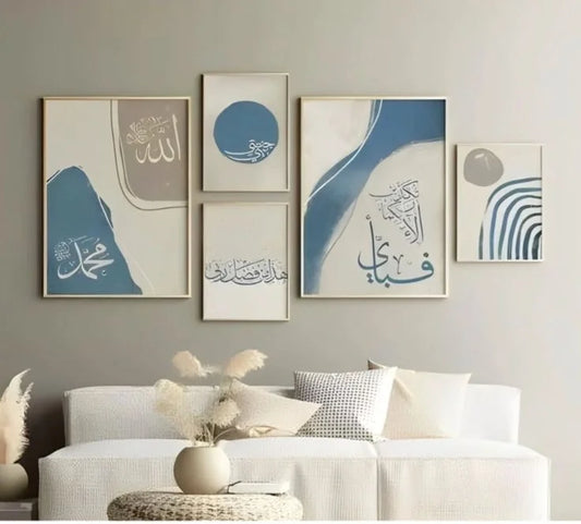 Living room with framed abstract art on the wall and a white sofa.
Postor.pk