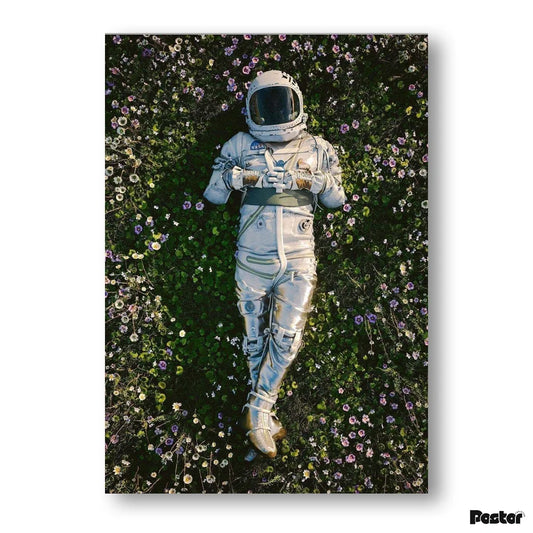 Astronaut lying on grass with flowers