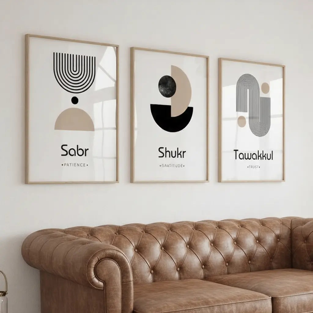 Three framed abstract artworks on a wall above a brown leather sofa.