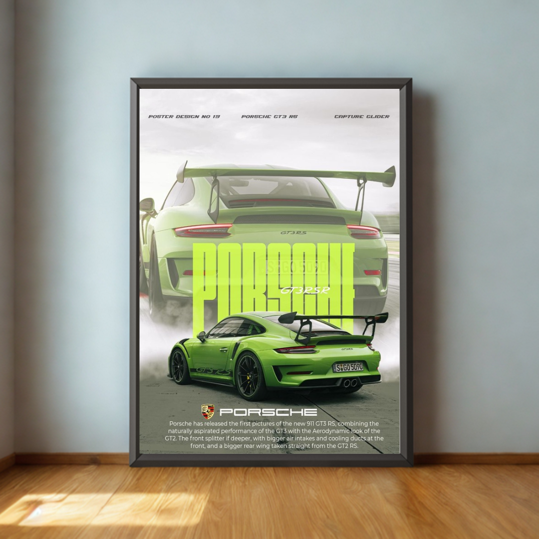 Framed poster of a green Porsche car on a wall.